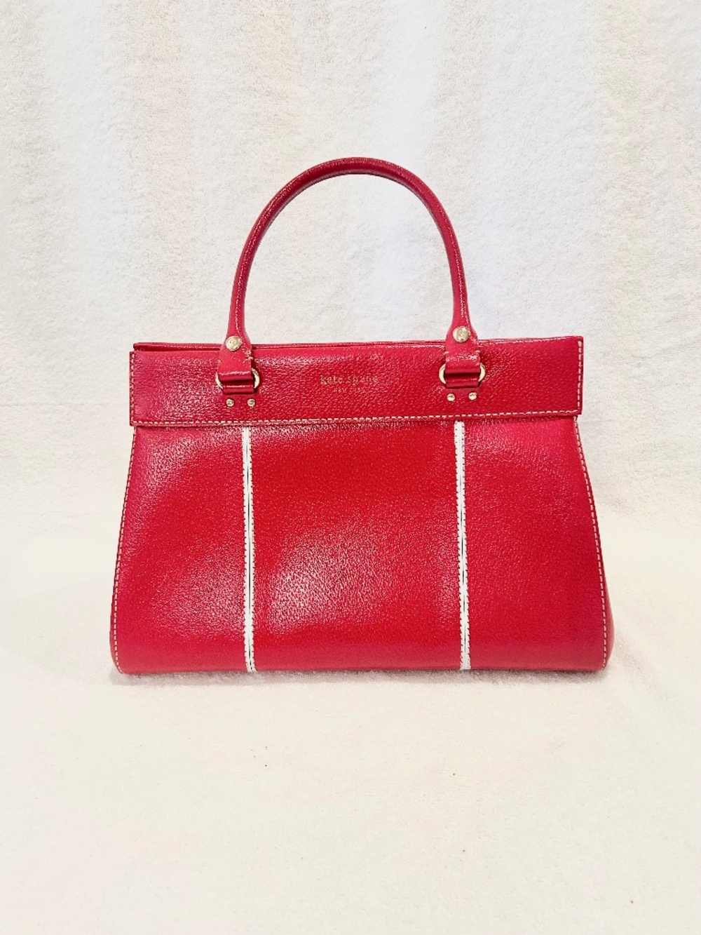 Red Kate Spade purse handbag white stripes